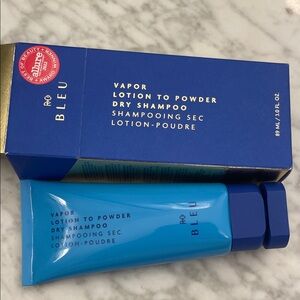 R+Co Bleu Vapor Lotion to Powder Dry Shampoo in Blue